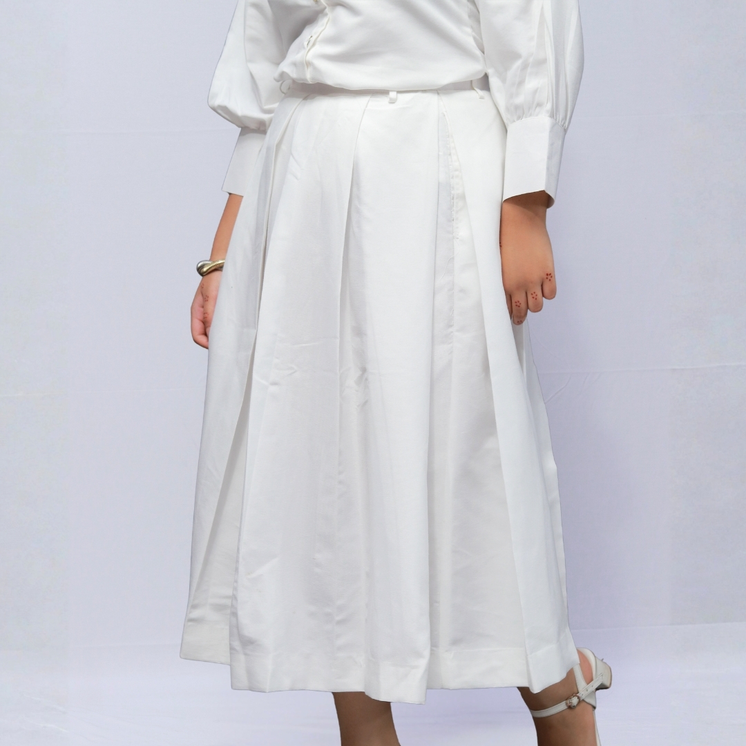 white box plated skirt with ballon seves shirt & touch of golden botton white box plated skirt with ballon seves shirt & touch of golden botton
