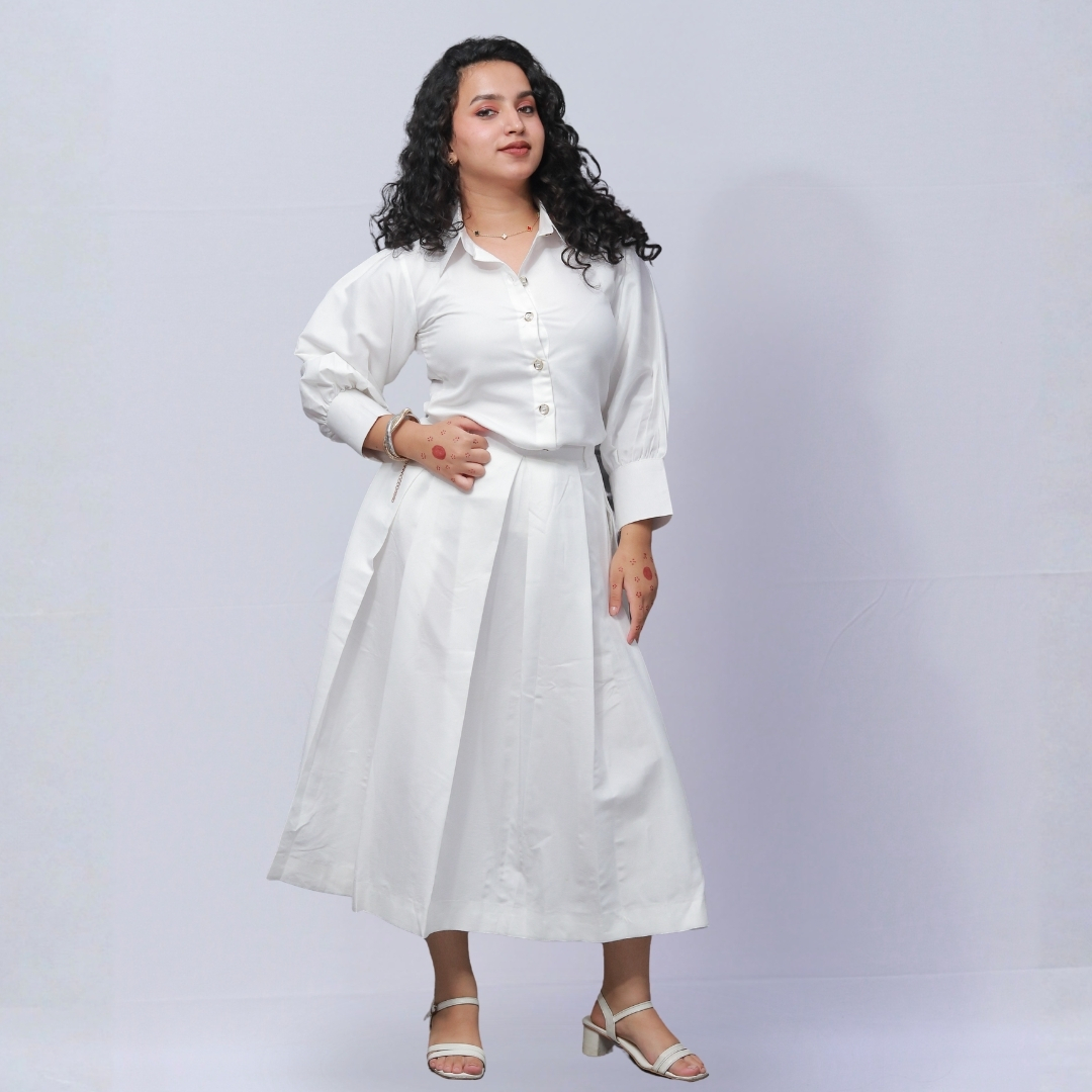 white box plated skirt with ballon seves shirt & touch of golden botton white box plated skirt with ballon seves shirt & touch of golden botton
